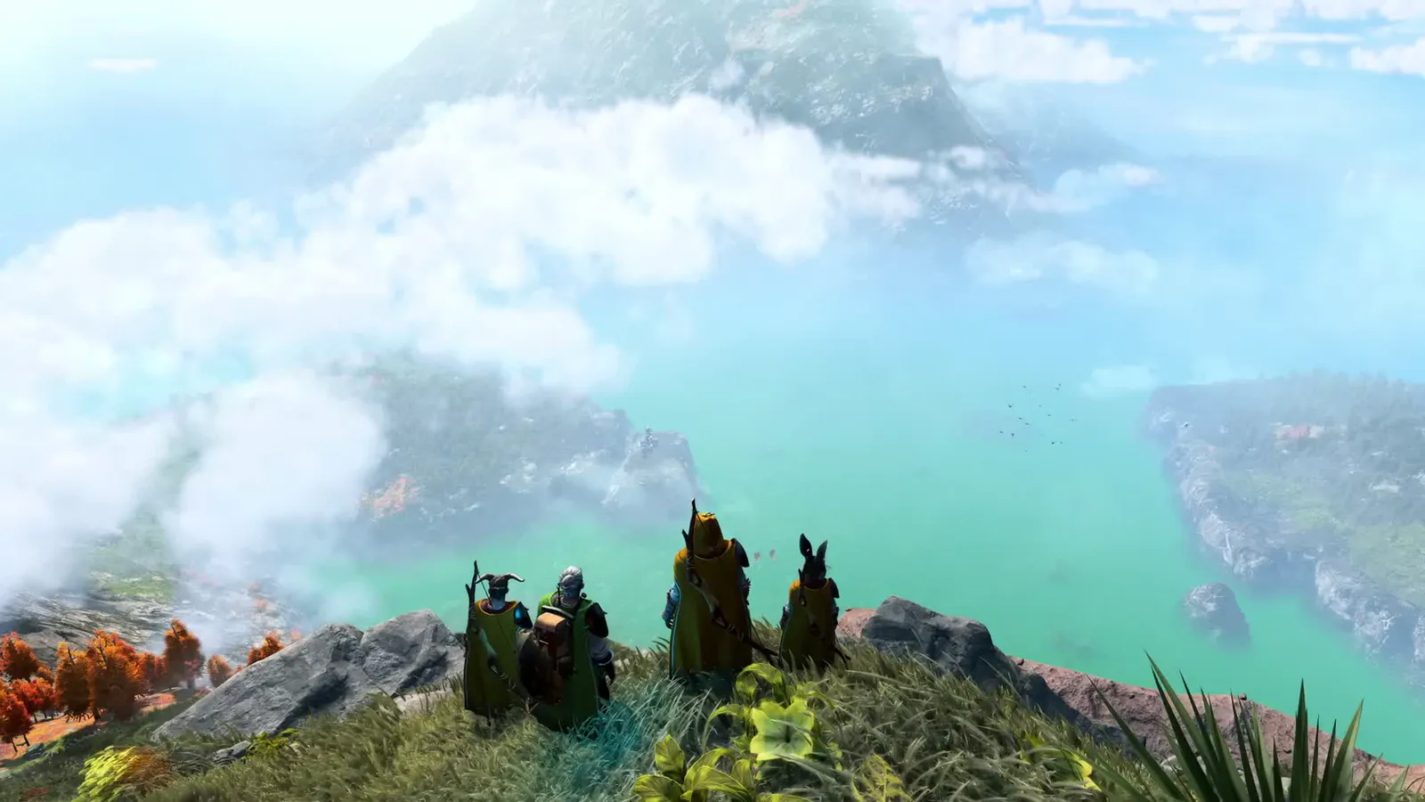 Four characters standing on the edge of a cliff.